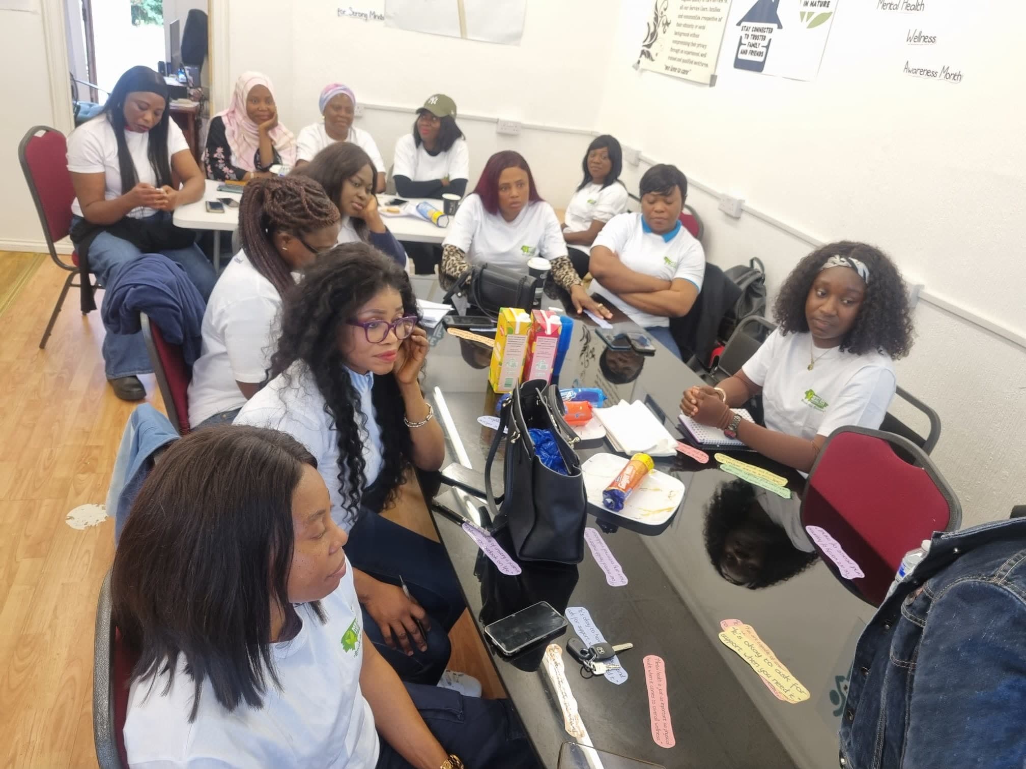 Nema carers in white t-shirts taking part in a training session